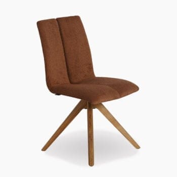 Luxe eetkamerstoel van Houweling Interieur. Design eetkamerstoelen uitgevoerd in bruine ribstof en een optisch gespleten rug.