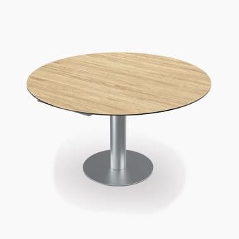 Ronde uitschuifbare eettafel bij Houweling Interieur. Ronde uitschuiftafel met keramiek tafelblad en metalen poot.