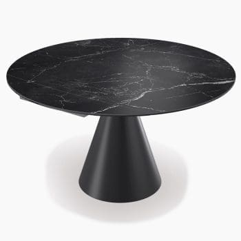 Uitschuifbare ronde eettafel bij Houweling Interieur. Design eettafel met keramiek tafelblad en metalen poot.
