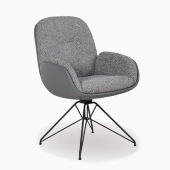 Luxe eetkamerstoel bij Houweling Interieur. Moderne eetkamerstoel uitgevoerd in grijze stof en leer met zwart metalen onderstel.