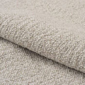 Meubelstoffen bij Houweling Interieur. Serra meubelstof van De Ploeg stoffen uitgevoerd in crèmekleur.