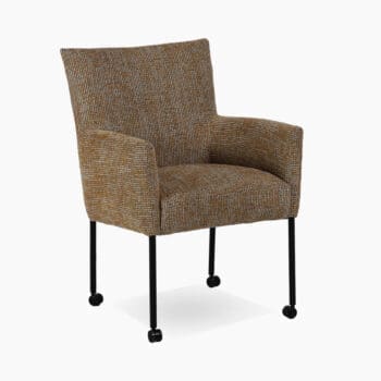 Luxe eetkamerstoel bij Houweling Interieur. Een eetfauteuil uitgevoerd in stof met geel- en grijstinten.