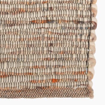 Jute vloerkleed bij Houweling Interieur van De Munk Carpets. Karpet uitgevoerd in crème en bruintinten.