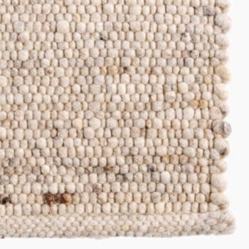 Jute vloerkleed bij Houweling Interieur van De Munk Carpets. Karpet uitgevoerd in crèmekleuren.