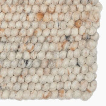 Wollen vloerkleed bij Houweling Interieur van De Munk Carpets. Karpet uitgevoerd in crème en bruintinten.