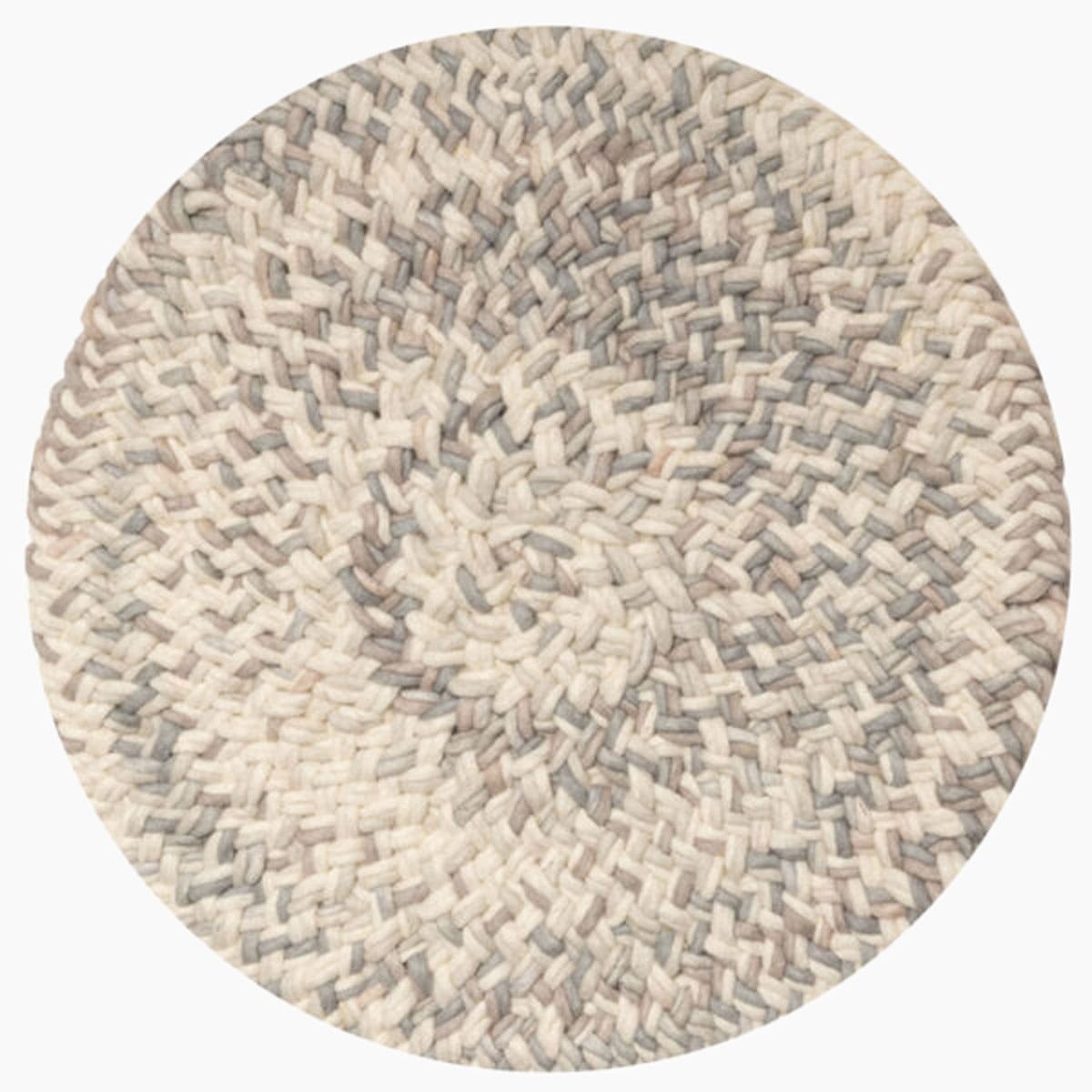 Rond vloerkleed bij Houweling Interieur van De Munk Carpets. Karpet uitgevoerd in crème- en grijstinten.