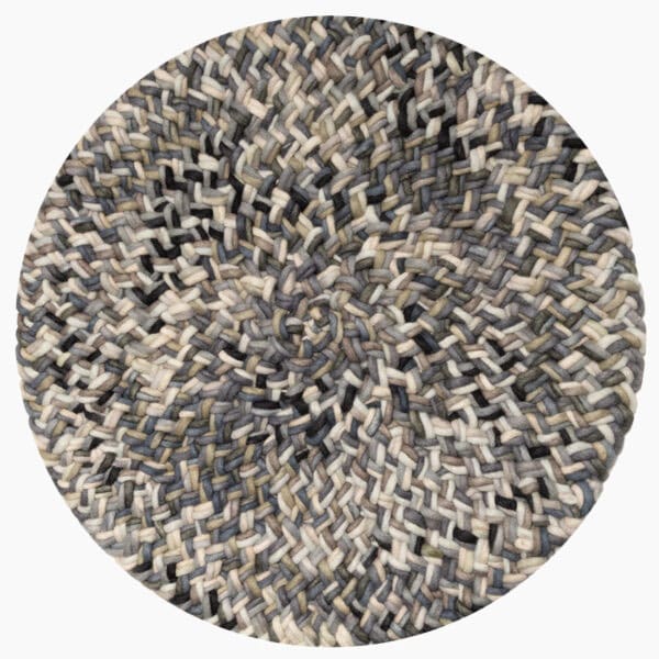 Rond vloerkleed bij Houweling Interieur van De Munk Carpets. Karpet uitgevoerd in crème- en grijstinten.