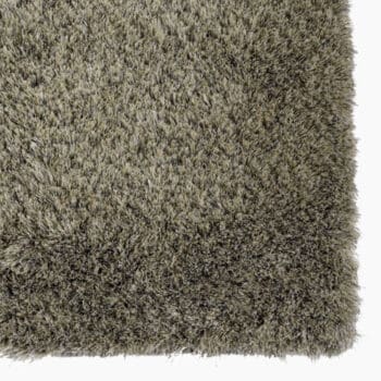 Modern vloerkleed bij Houweling Interieur van De Munk Carpets. Karpet uitgevoerd in groentinten.