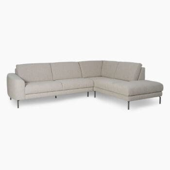 Modulaire hoekbank bij Houweling Interieur. Het is een design bank uitgevoerd in lichte stof.